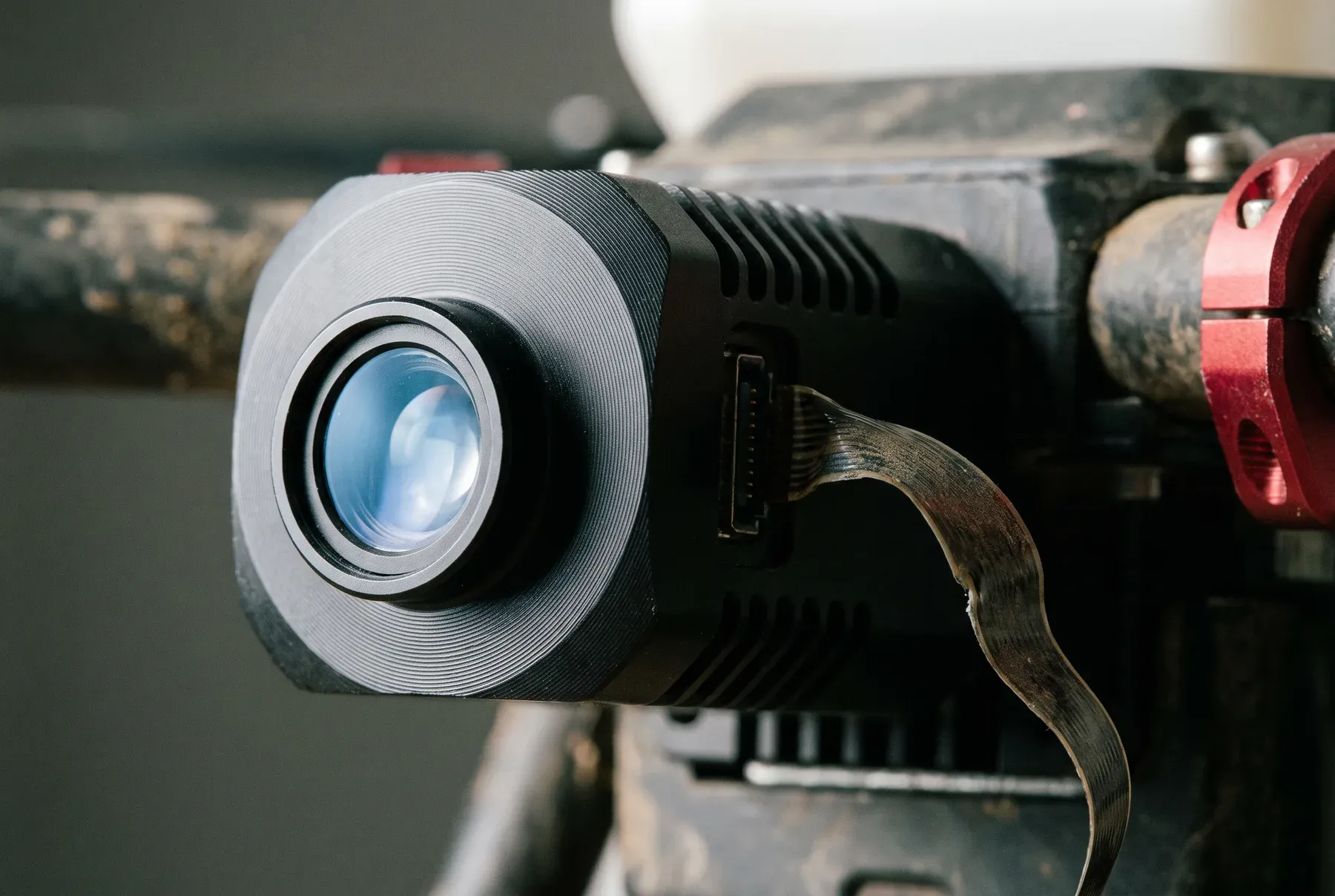 A close-up of an agricultural drone's sensor unit